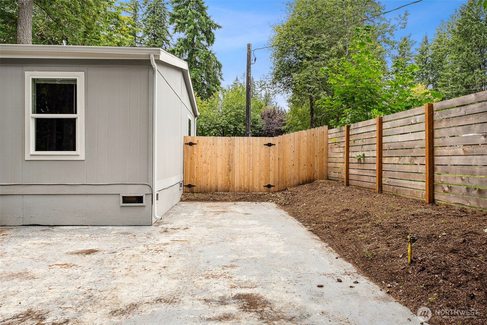 8107 Mazama Court Southwest Olympia, WA 98512 - Photo 3 of 34 a backyard of a house