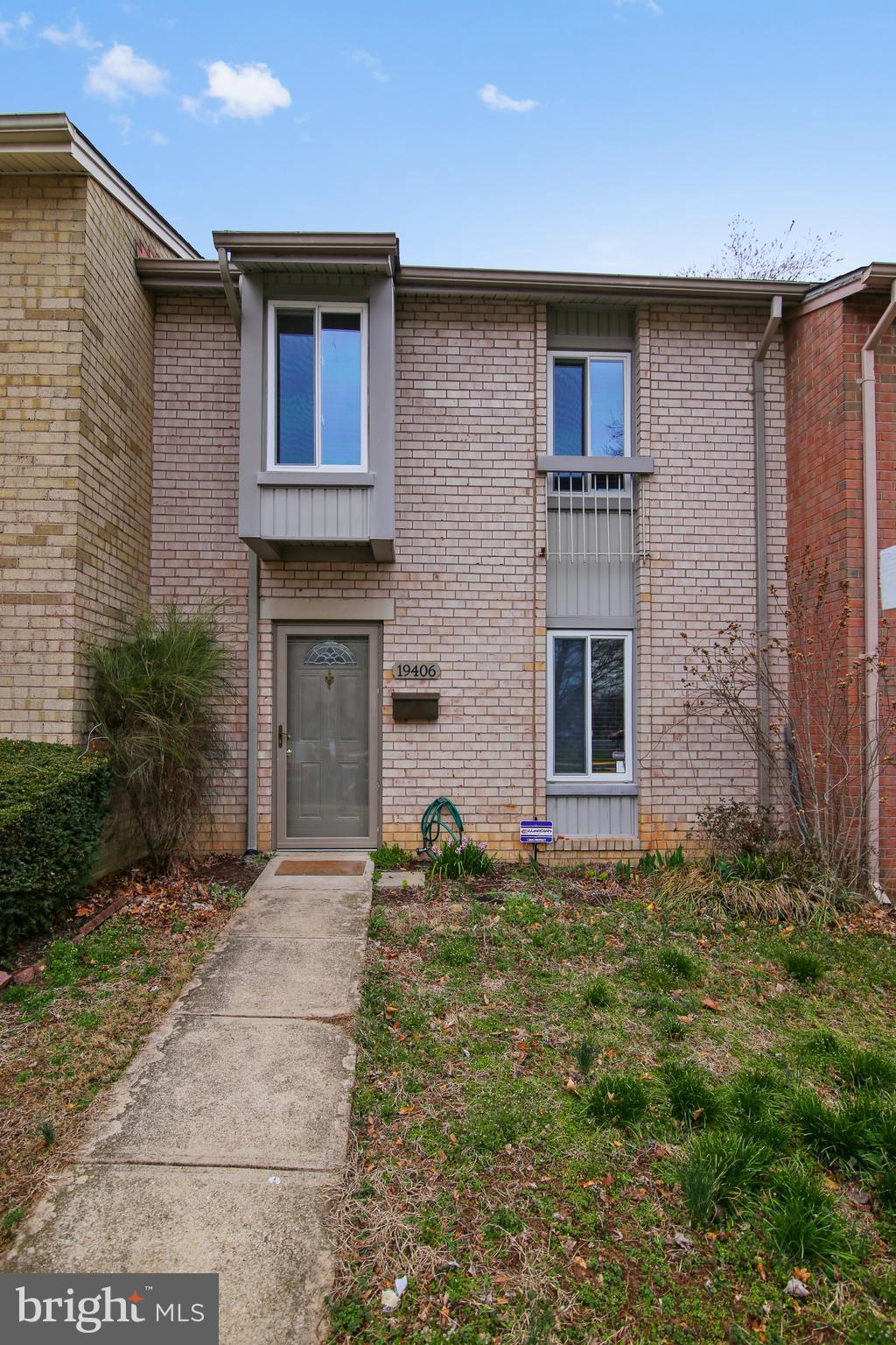19406 Thomas Farm Road Gaithersburg, MD 20886 - Photo 1 of 15 a view of front of a house with a yard