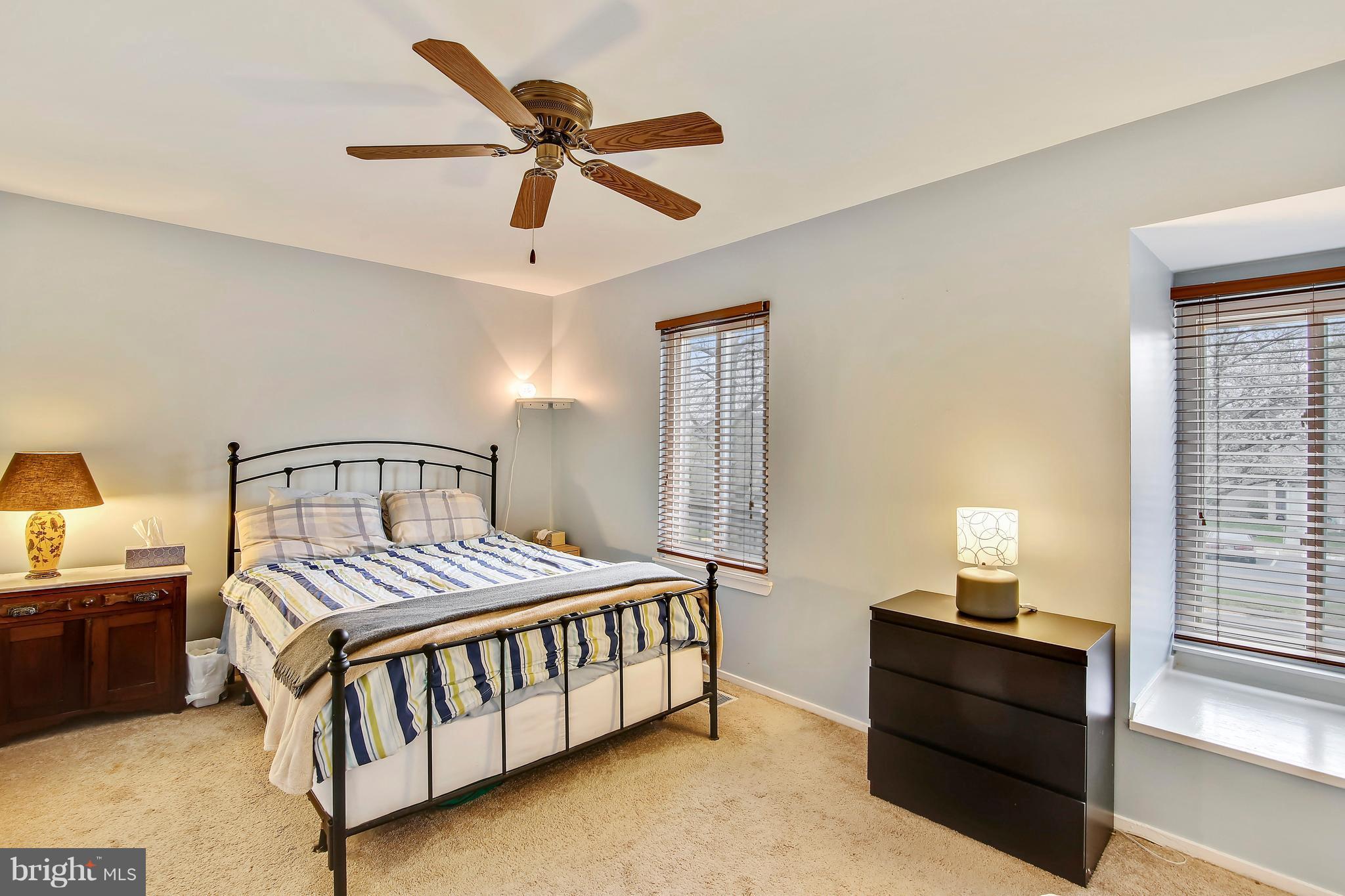 19406 Thomas Farm Road Gaithersburg, MD 20886 - Photo 9 of 15 a bedroom with a bed and a window