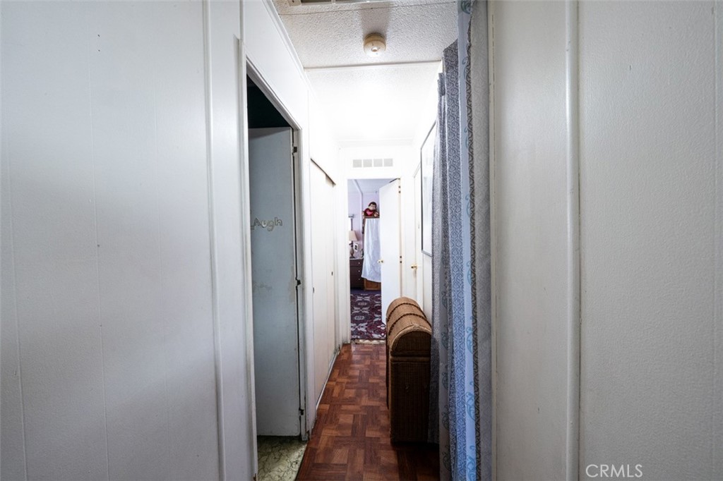 131 Colombo Lane Tustin, CA 92780 - Photo 11 of 19 a view of a hallway with a hallway