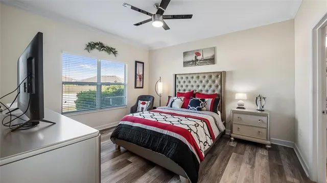 a bed room with a bed and a window