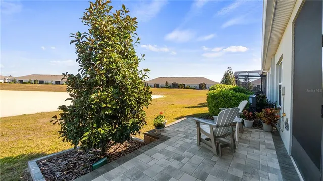 a view of a terrace with chair and table