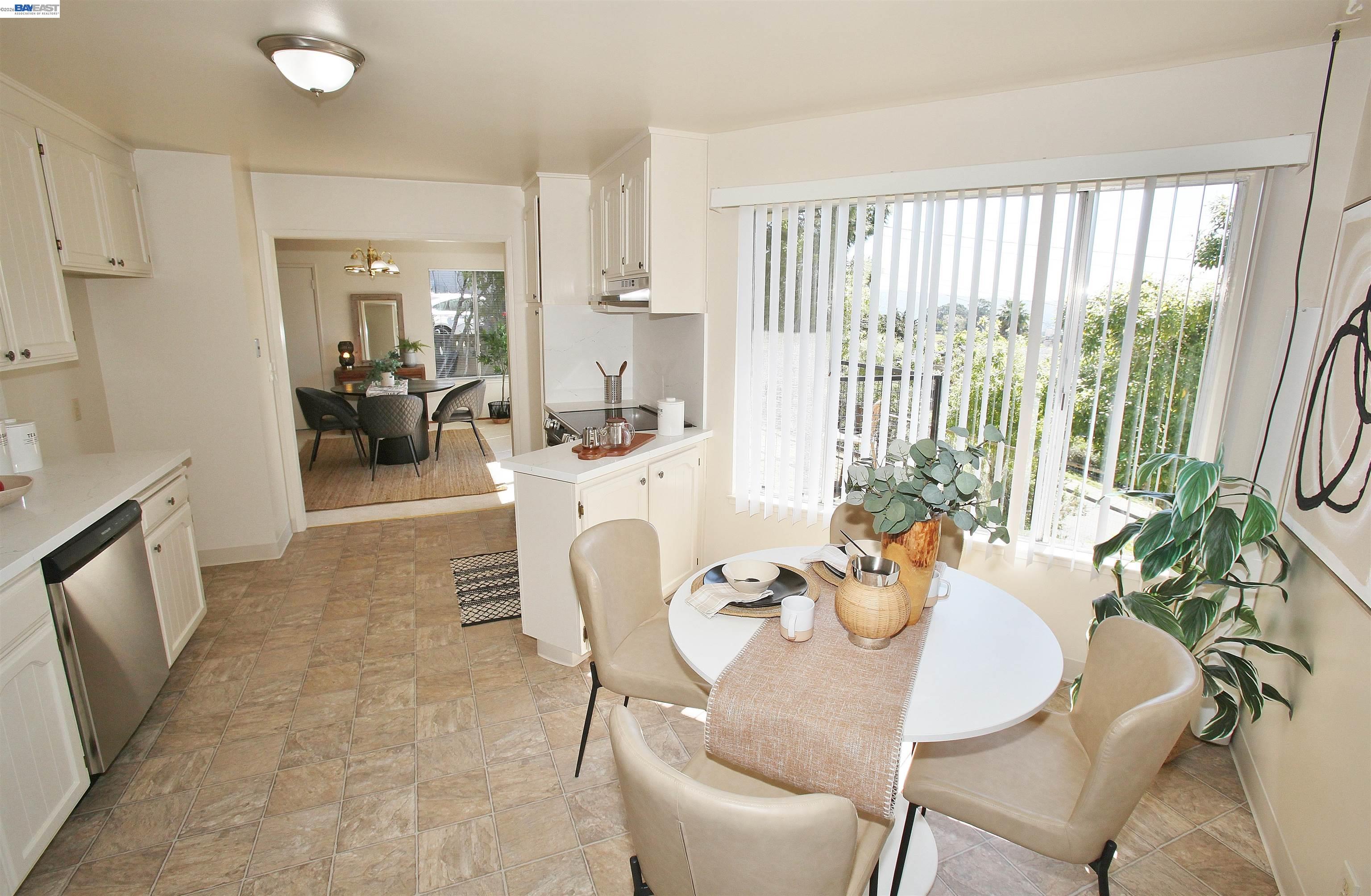 2728 Sheffield Place Castro Valley, CA 94546 - Photo 13 of 29 a view of a dining room with furniture a potted plant and wooden floor