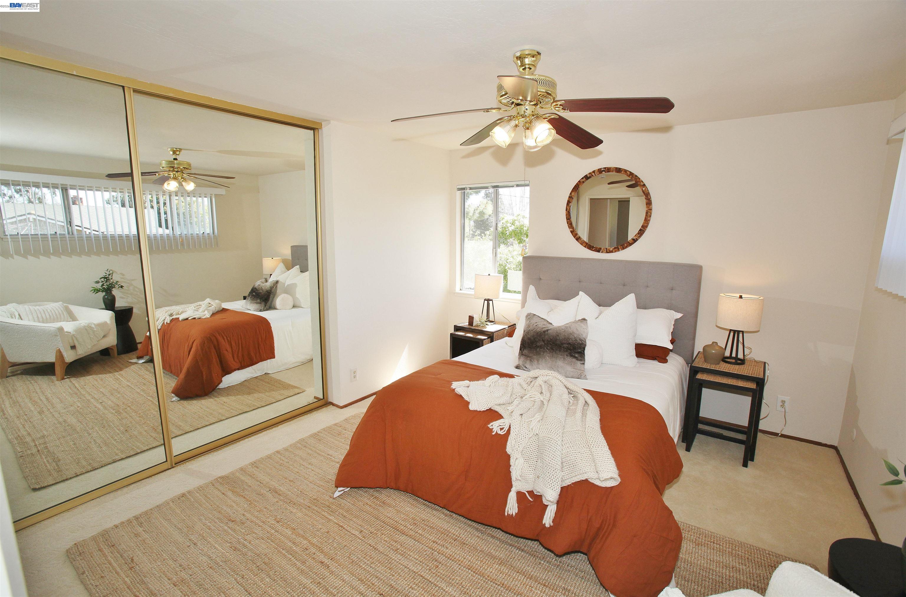 2728 Sheffield Place Castro Valley, CA 94546 - Photo 15 of 29 a bedroom with bed and a chandelier