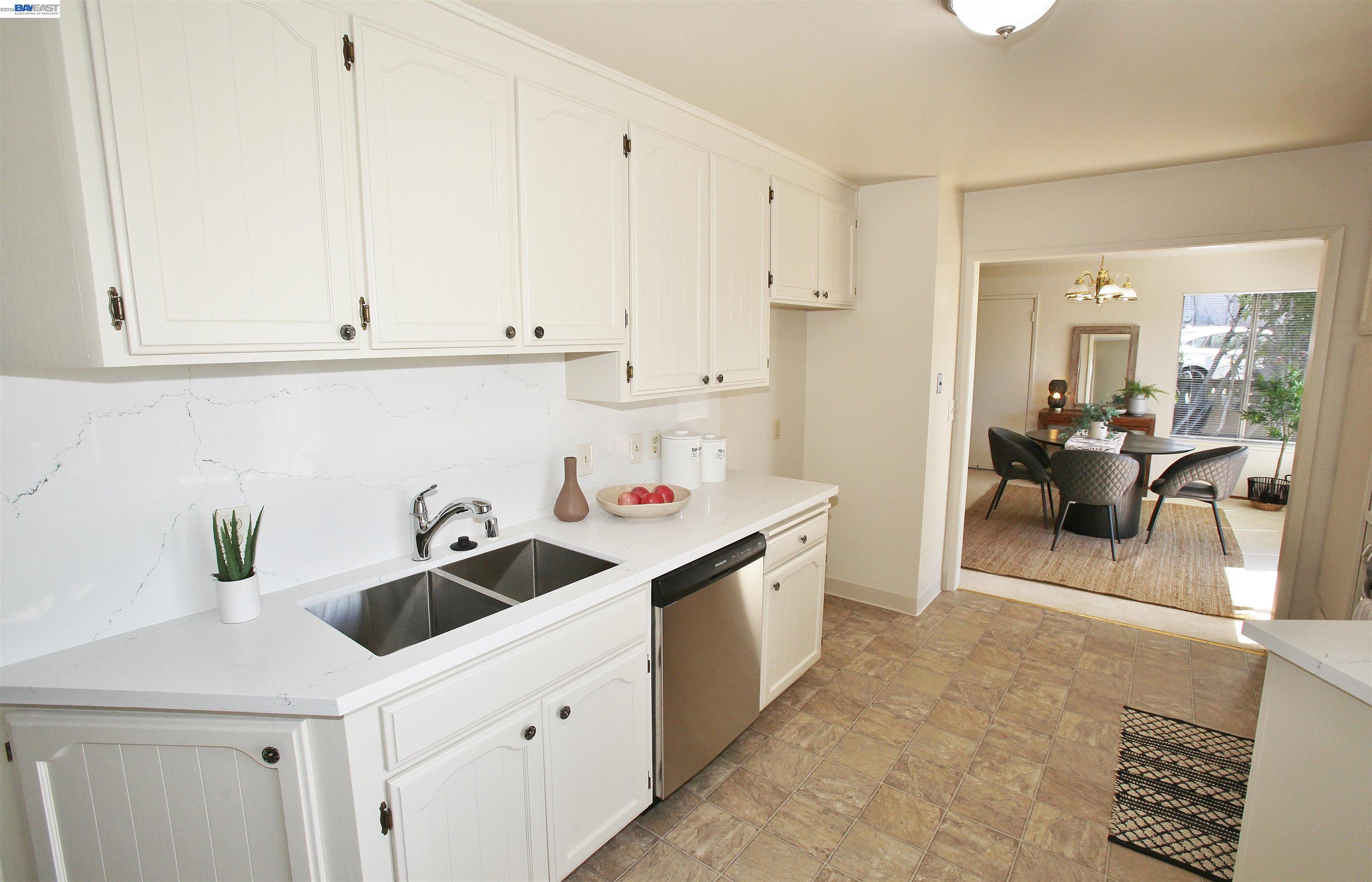 2728 Sheffield Place Castro Valley, CA 94546 - Photo 19 of 29 a kitchen with a sink cabinets and window