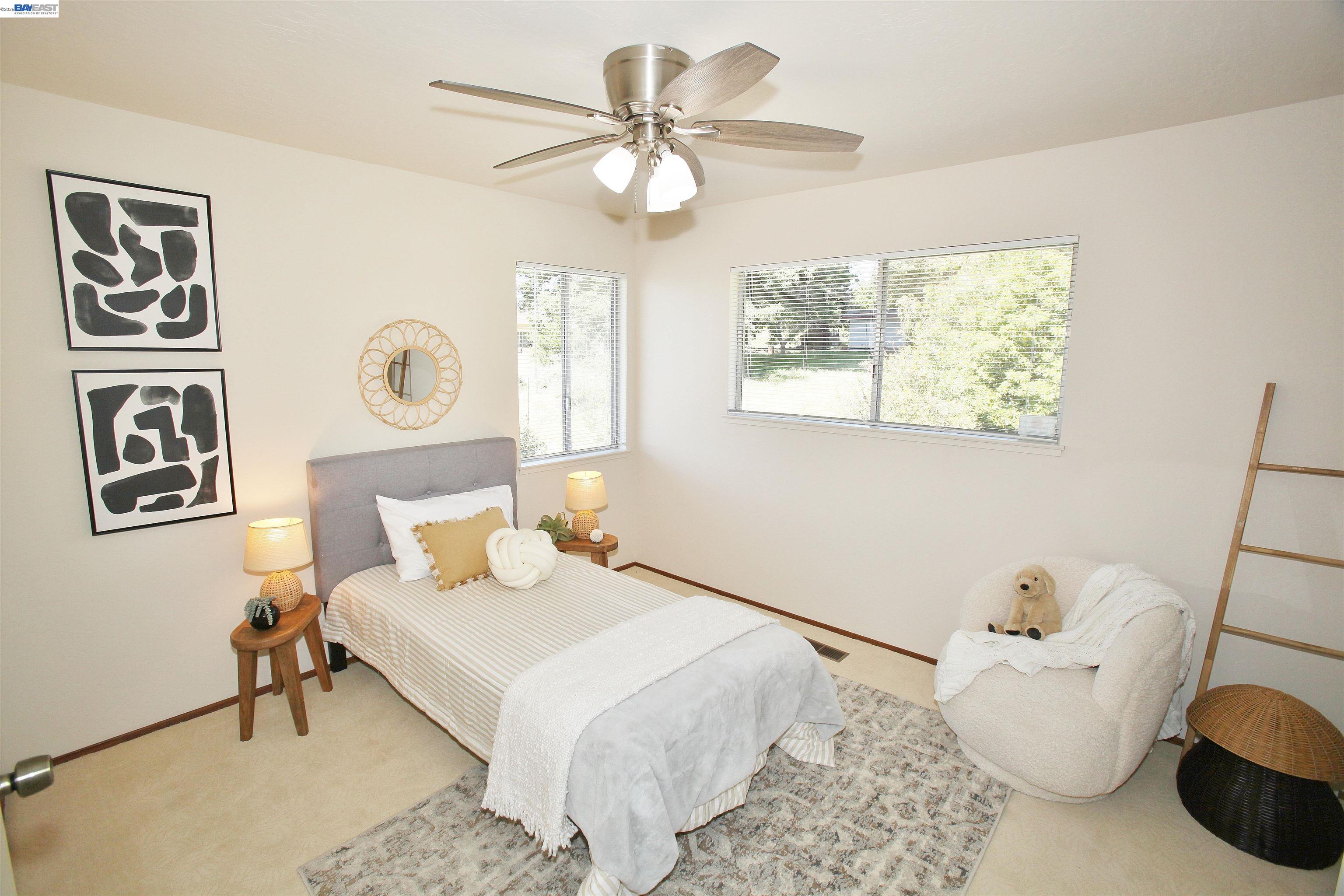 2728 Sheffield Place Castro Valley, CA 94546 - Photo 22 of 29 a bedroom with a bed and wooden floor