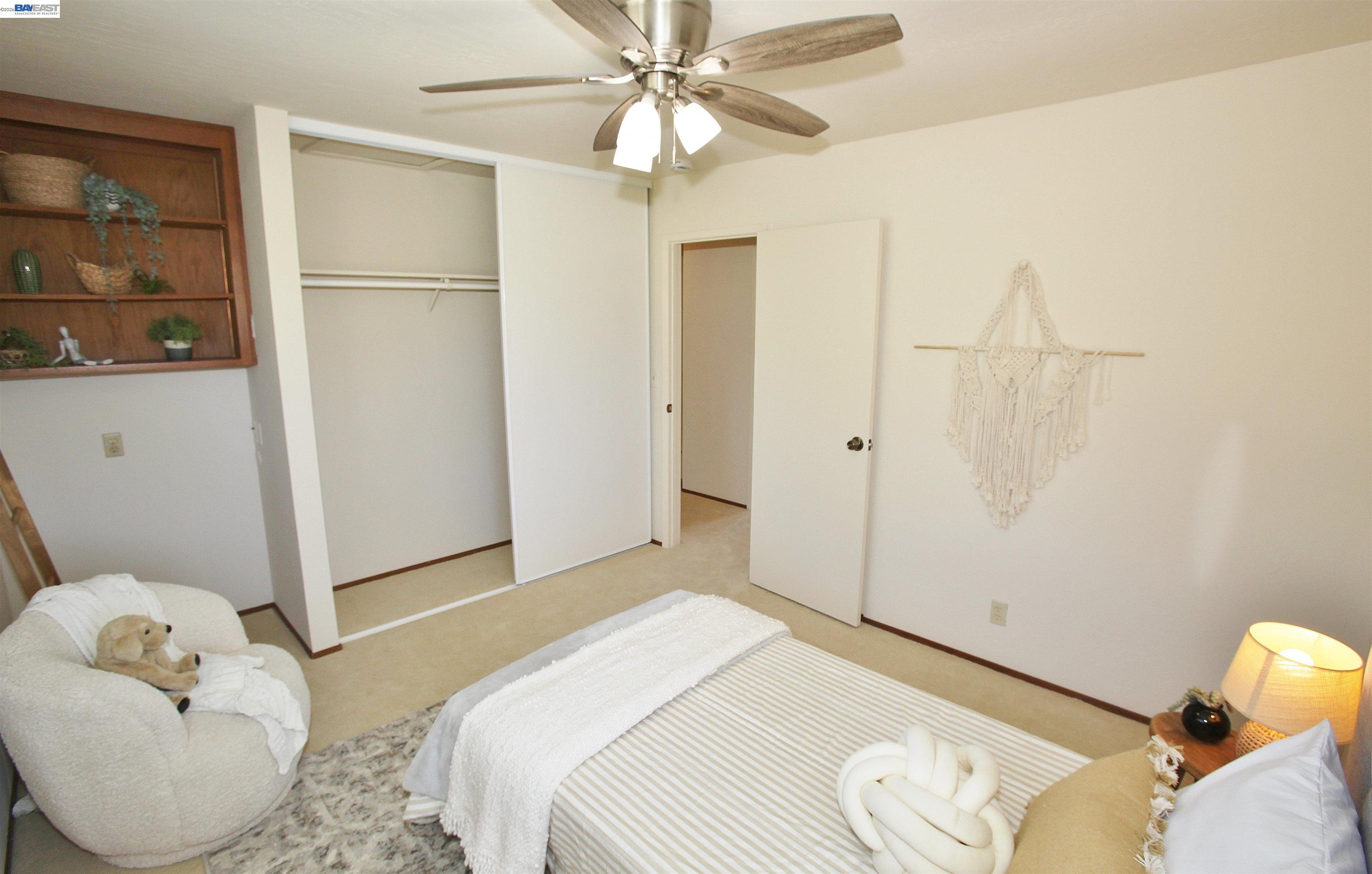2728 Sheffield Place Castro Valley, CA 94546 - Photo 23 of 29 a bedroom with a bed and a chandelier