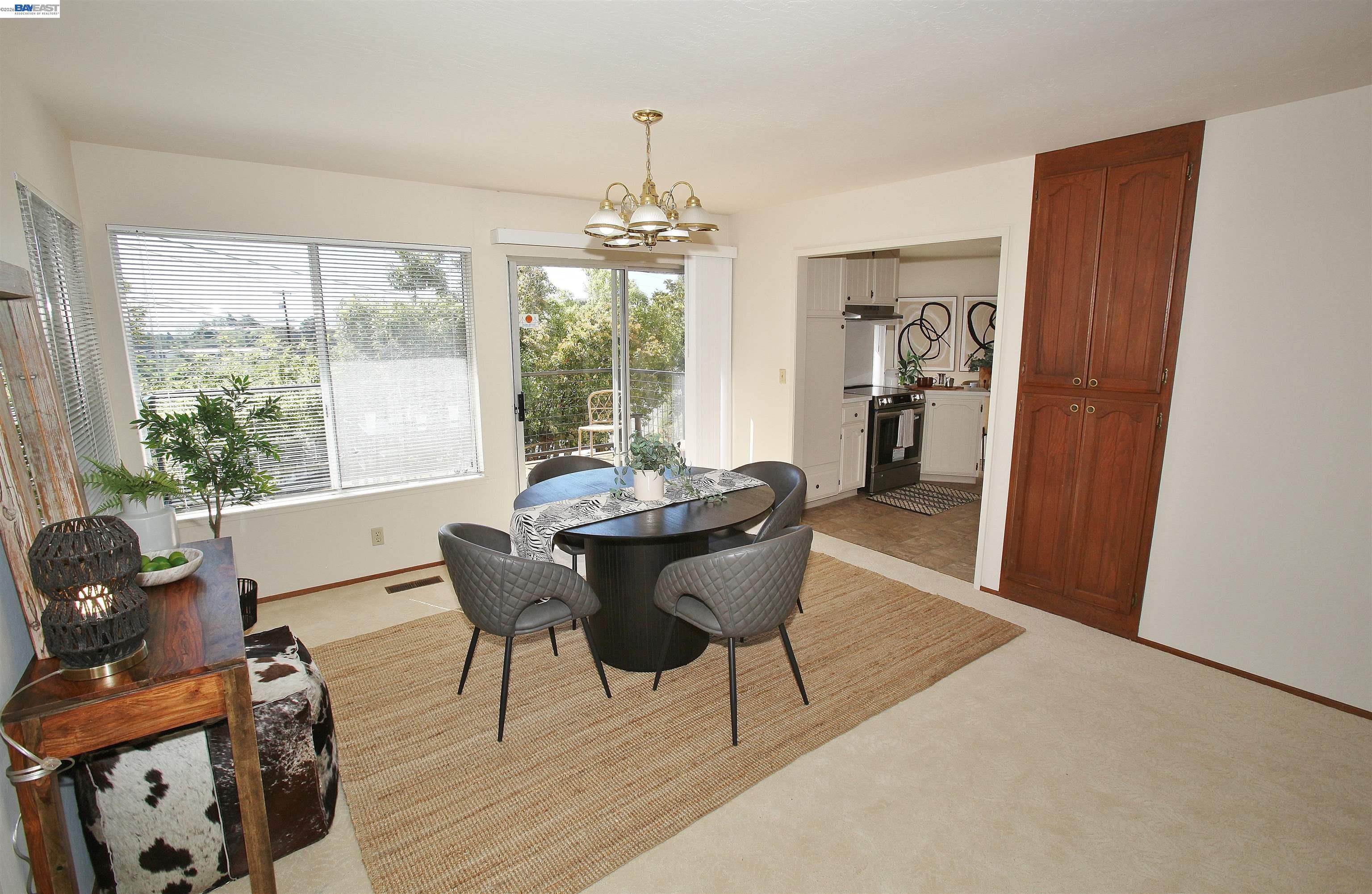 2728 Sheffield Place Castro Valley, CA 94546 - Photo 8 of 29 a dining room with furniture a chandelier and wooden floor