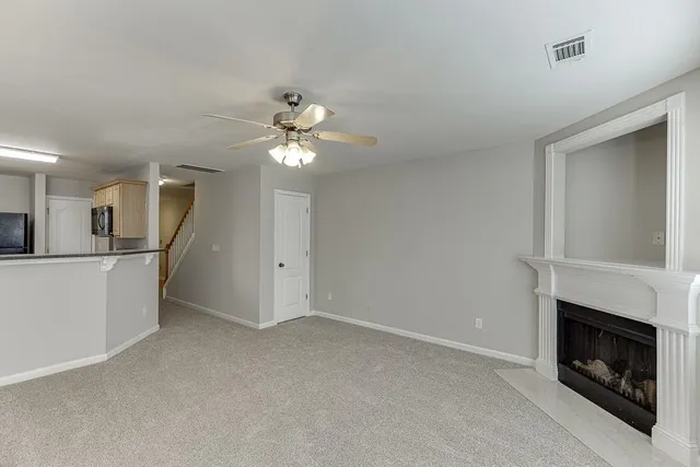 a view of a livingroom with a fireplace