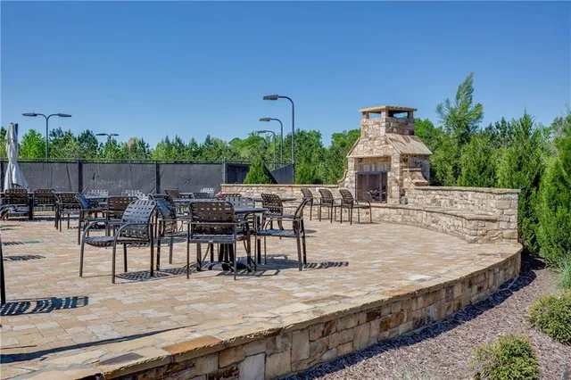 a view of a swimming pool with chairs