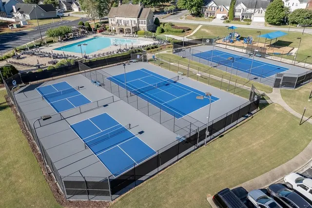 an aerial view of a house with a garden