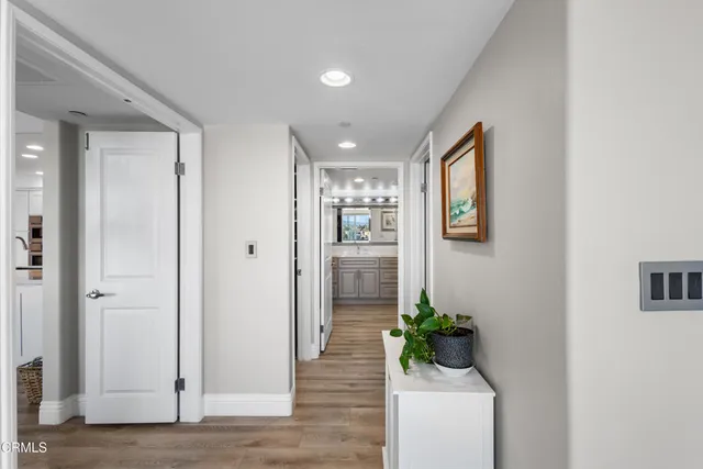 a view of walk in closet with clothes