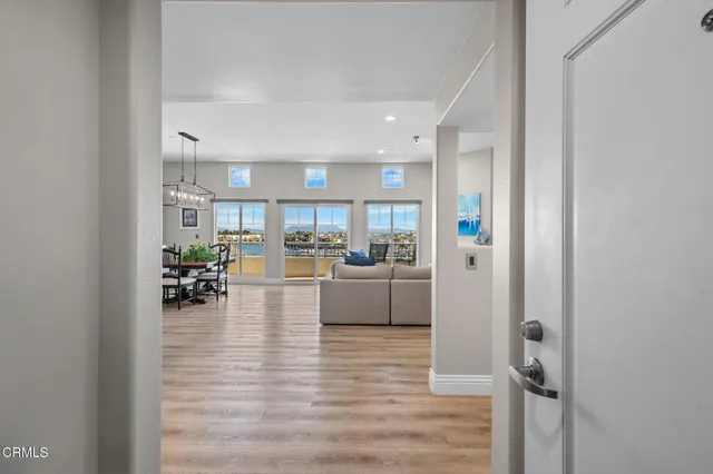 a view of kitchen and dining area with living room