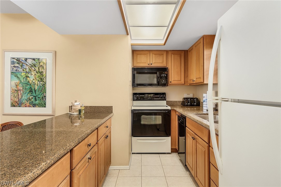 600 Neapolitan Way, Unit 239 Naples, FL 34103 - Photo 8 of 29 Gallery Image 8