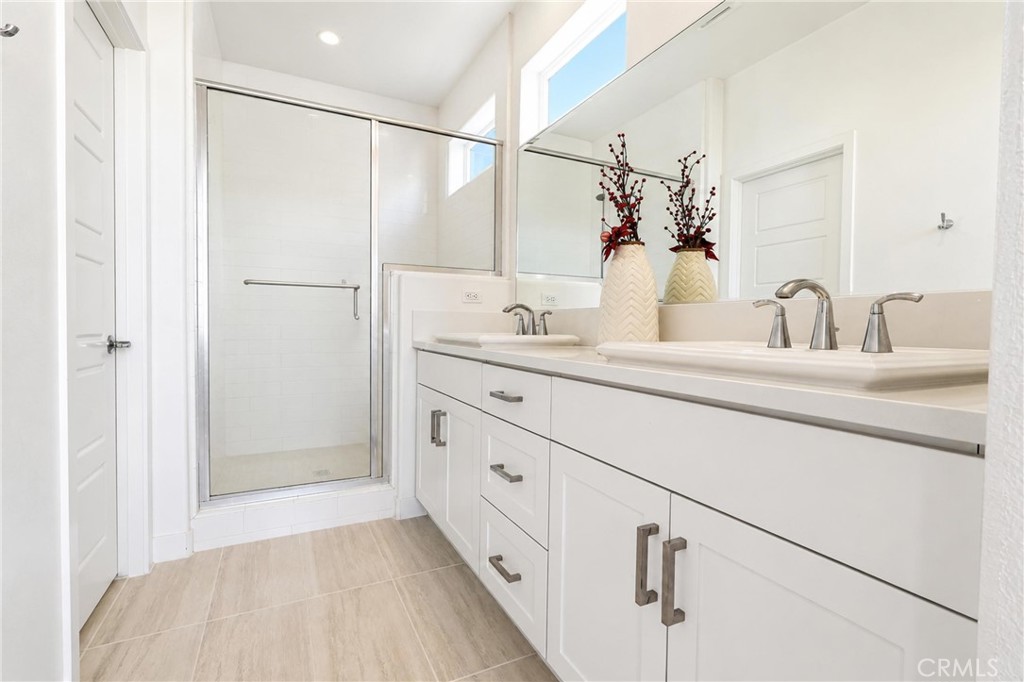 253 Waypoint Tustin, CA 92782 - Photo 39 of 56 dual sink vanity and large walk in shower