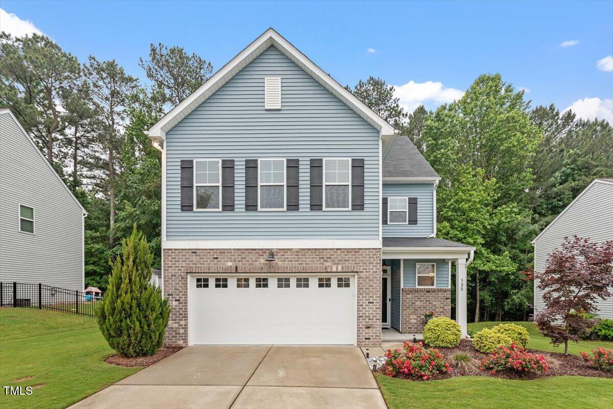 320 Everly Mist Way Wake Forest, NC 27587 - Photo 1 of 34 a view of front a house with a yard