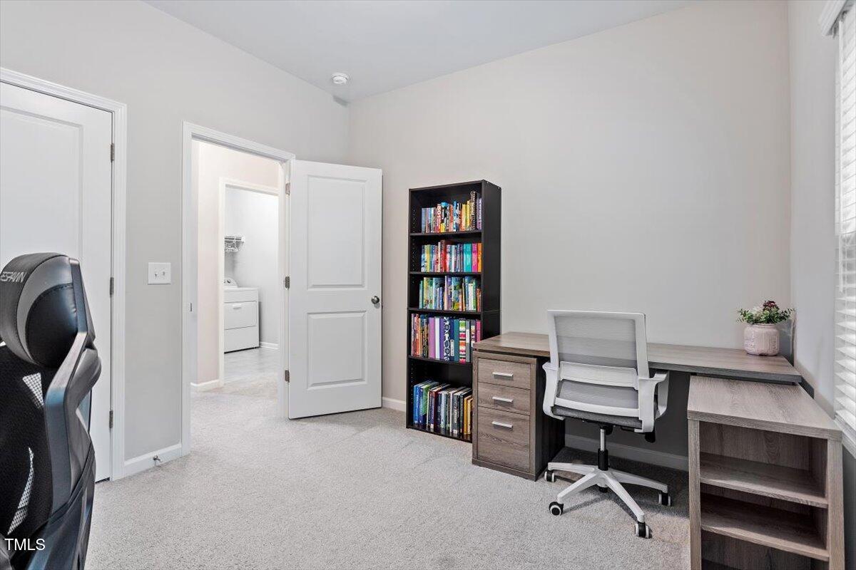 320 Everly Mist Way Wake Forest, NC 27587 - Photo 18 of 34 a view of a workspace with furniture