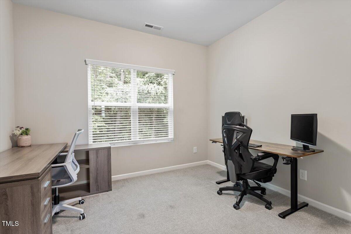 320 Everly Mist Way Wake Forest, NC 27587 - Photo 19 of 34 a view of a workspace with a window