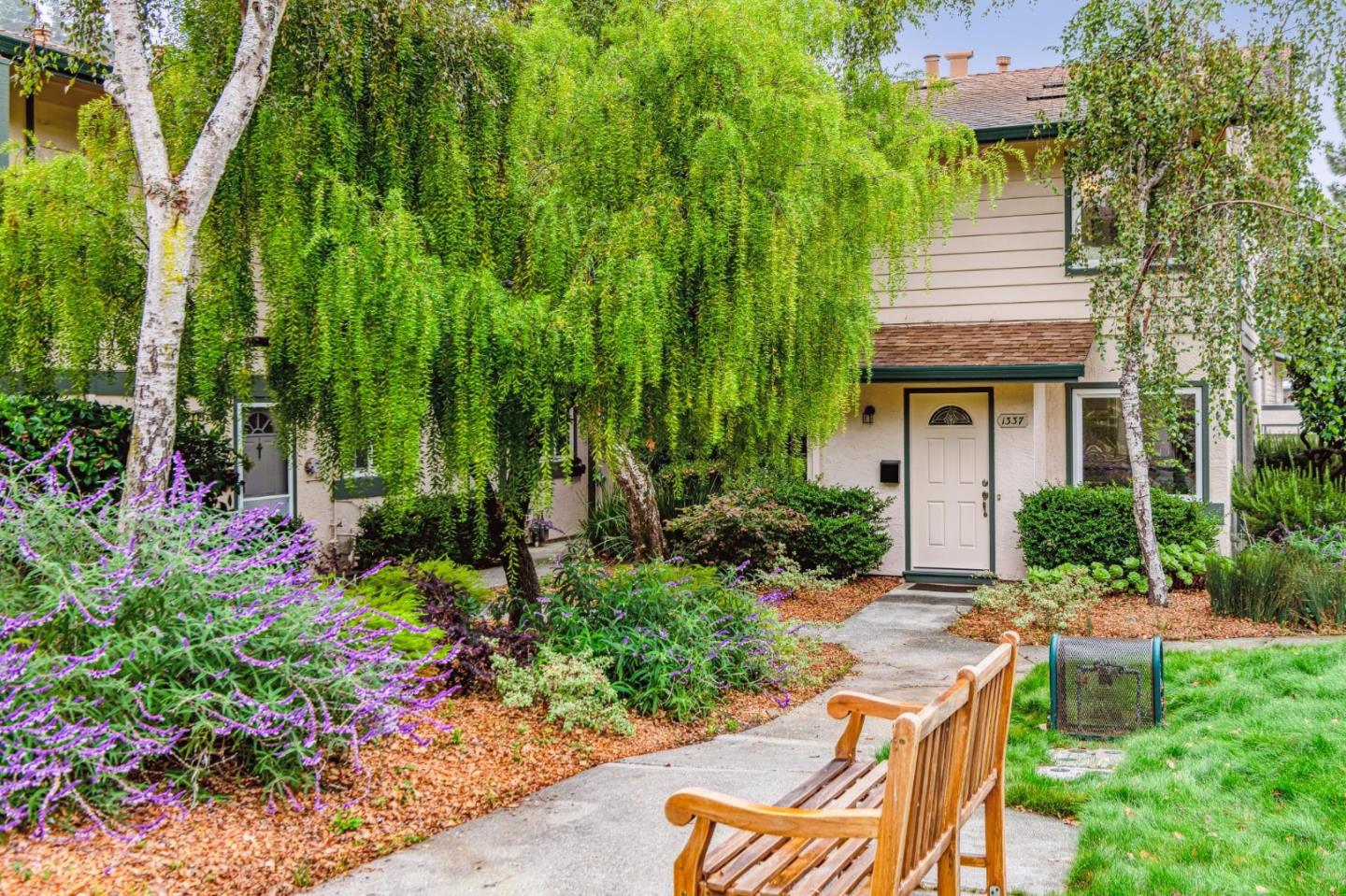 1337 Terra Nova Boulevard Pacifica, CA 94044 - Photo 1 of 21 a house view with a garden space