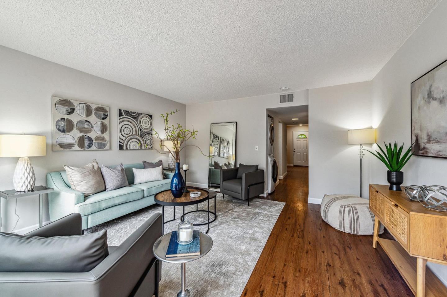 1337 Terra Nova Boulevard Pacifica, CA 94044 - Photo 10 of 21 a living room with furniture potted plant and a table