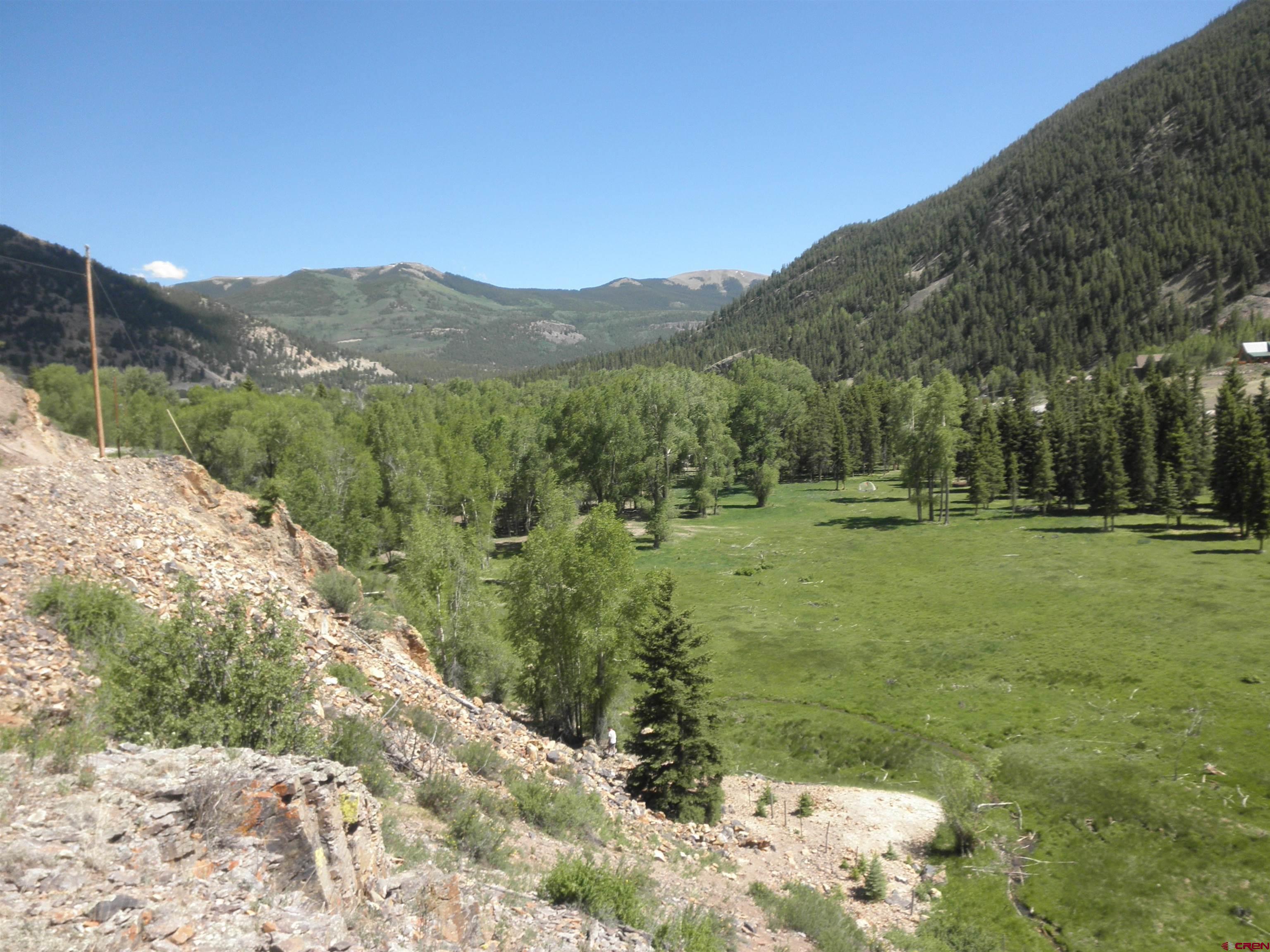 1426 Slumgullion Road Lake City, CO 81235 - Photo 10 of 15 a view of a field with a mountain