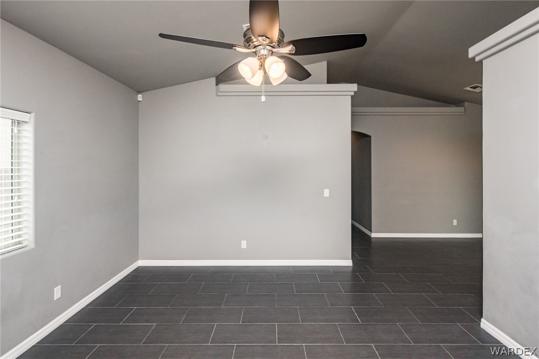 3621 North Kenneth Road Kingman, AZ 86409 - Photo 14 of 47 a view of an empty room with a window