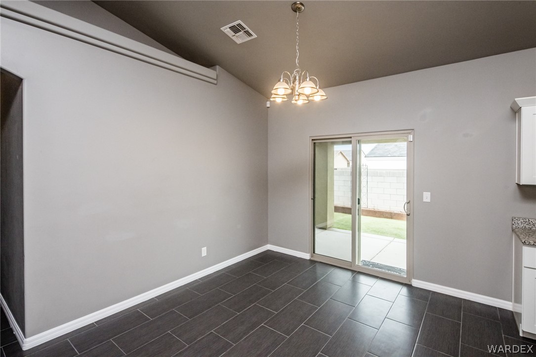 3621 North Kenneth Road Kingman, AZ 86409 - Photo 16 of 47 en view of an empty room with a window