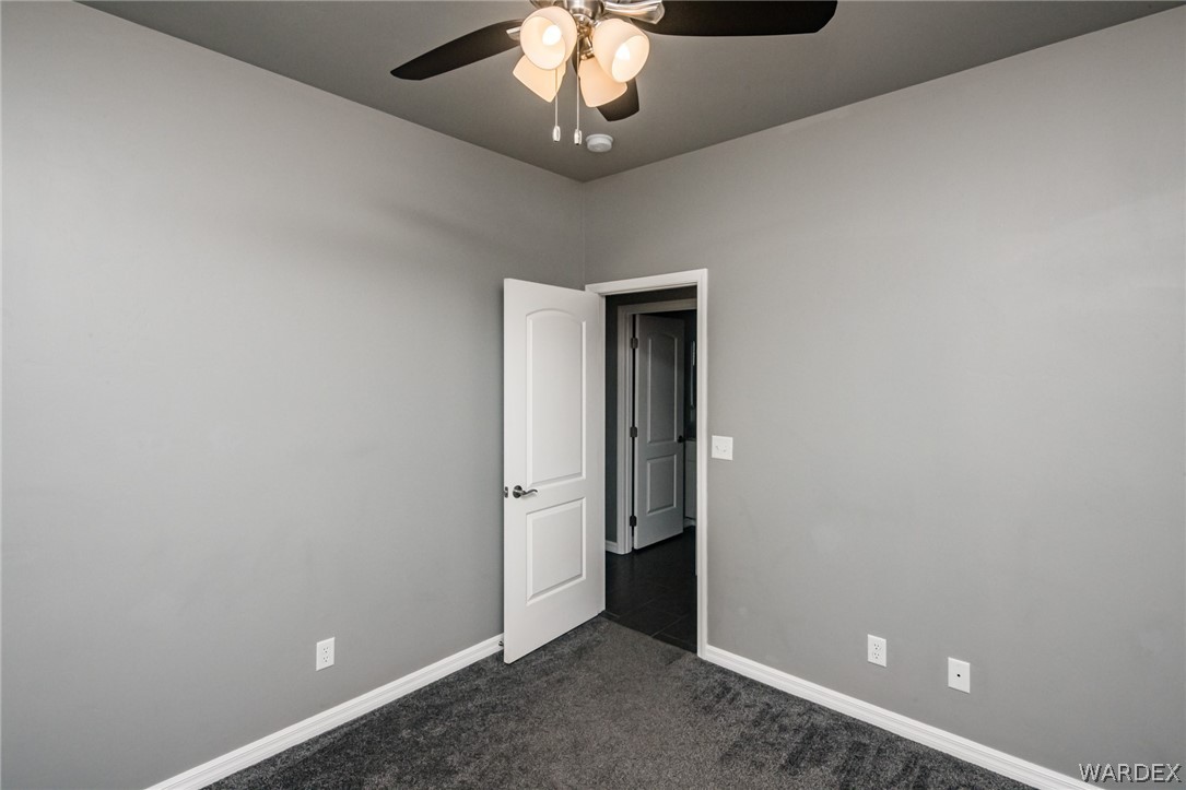 3621 North Kenneth Road Kingman, AZ 86409 - Photo 33 of 47 wooden floor in an empty room