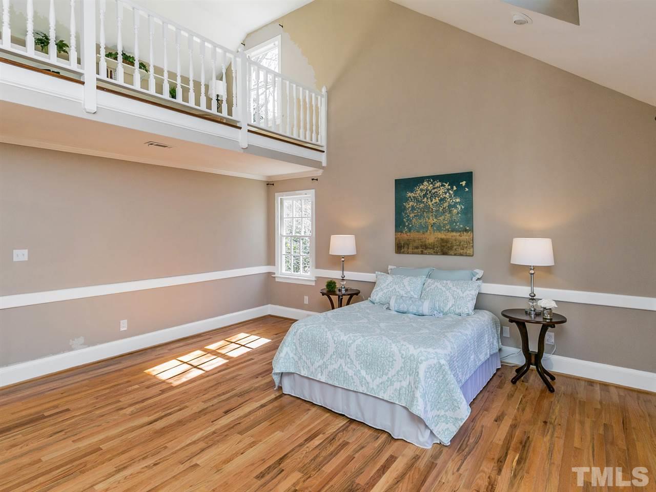 405 Bridgetender Drive Raleigh, NC 27615 - Photo 14 of 24 Vaulted ceiling makes space for private loft.