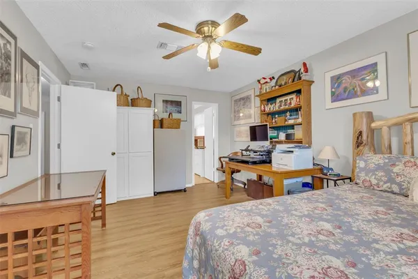 a view of kitchen with furniture and wooden floor