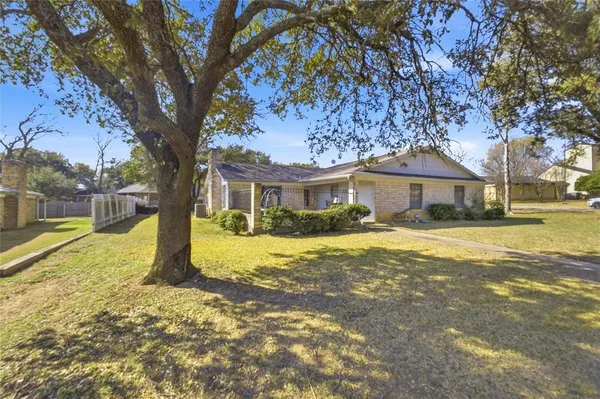 a house with trees in front of it