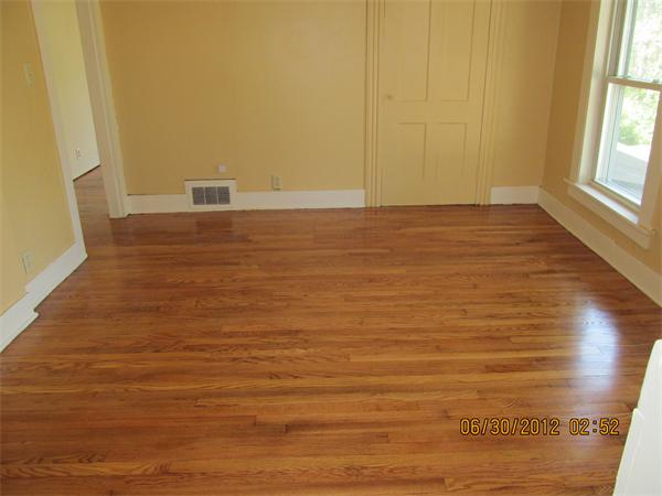 1574 Main Road Granville, MA 01034 - Photo 10 of 13 a view of empty room with window and wooden floor