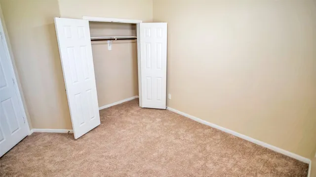 an empty room with a door