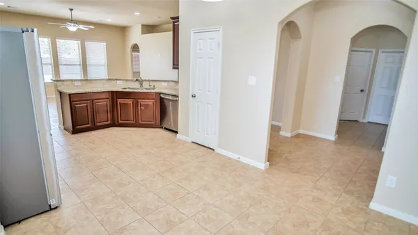 a view of a kitchen with a sink