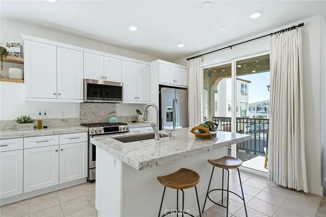 a view of living room and kitchen