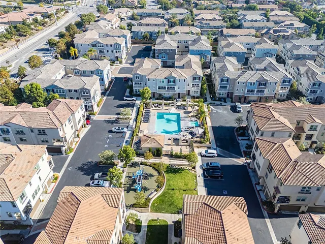 an aerial view of a city with lots of residential buildings