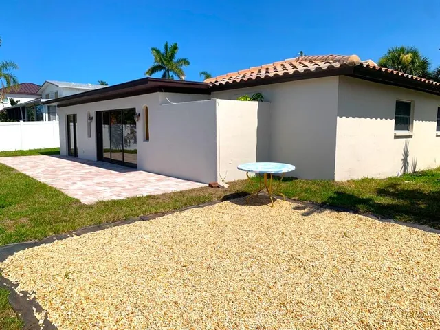 a view of a house with a patio