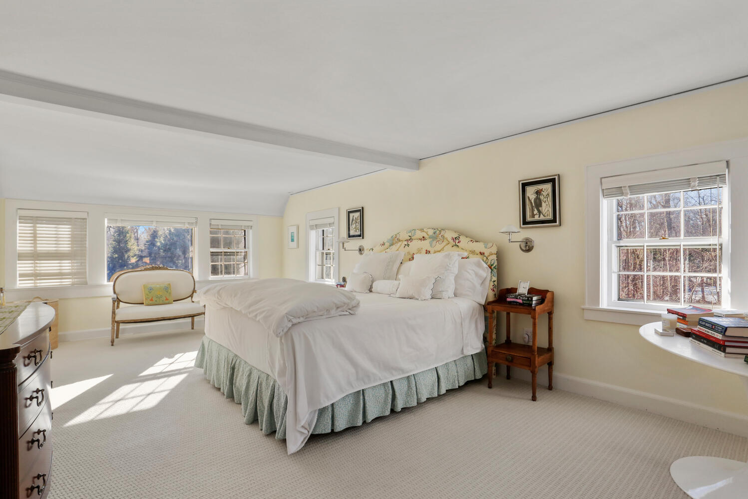 427 Eden Road Stamford, CT 06907 - Photo 15 of 40 a bedroom with a bed couch and a large window