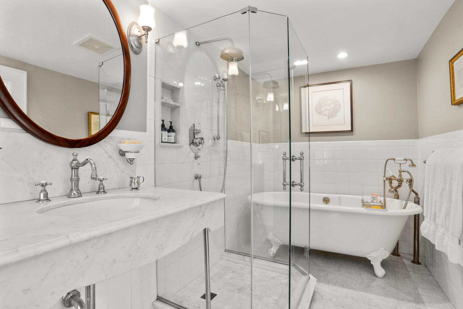 427 Eden Road Stamford, CT 06907 - Photo 16 of 40 a bathroom with a bathtub a sink and a mirror