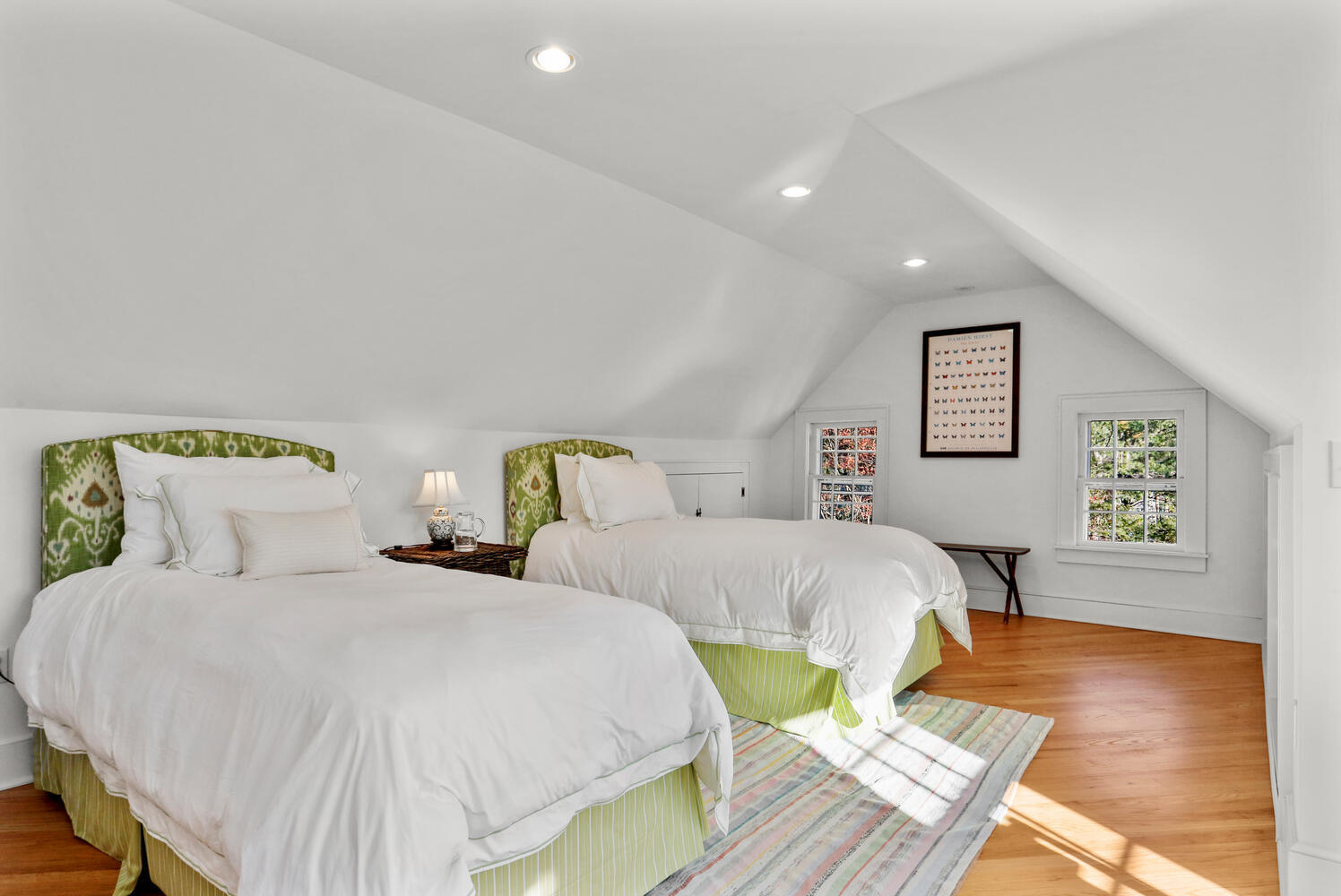427 Eden Road Stamford, CT 06907 - Photo 20 of 40 a bedroom with two beds and a wooden floor