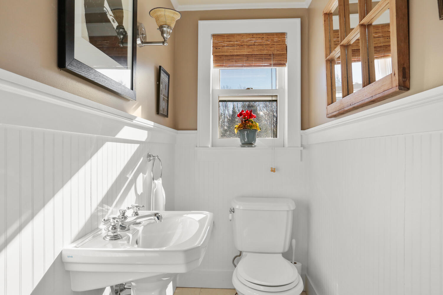 427 Eden Road Stamford, CT 06907 - Photo 25 of 40 a white toilet sitting next to a bathroom sink