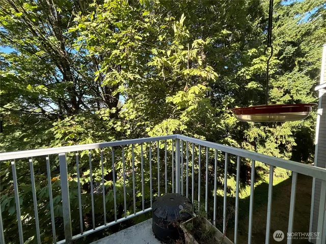 a view of a balcony with an outdoor space