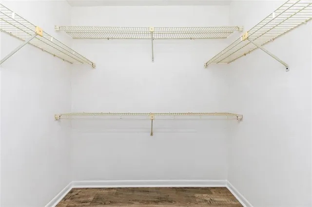 a view of a room with racks on the wall