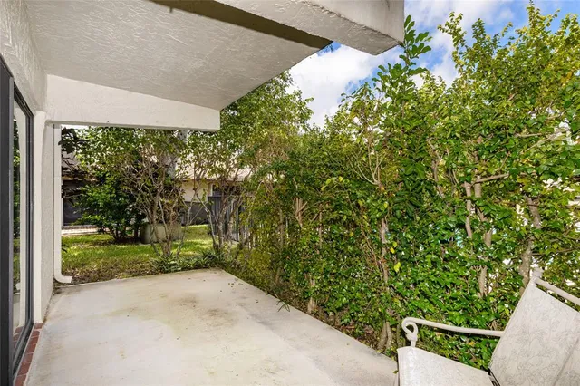 a view of a yard with an outdoor space