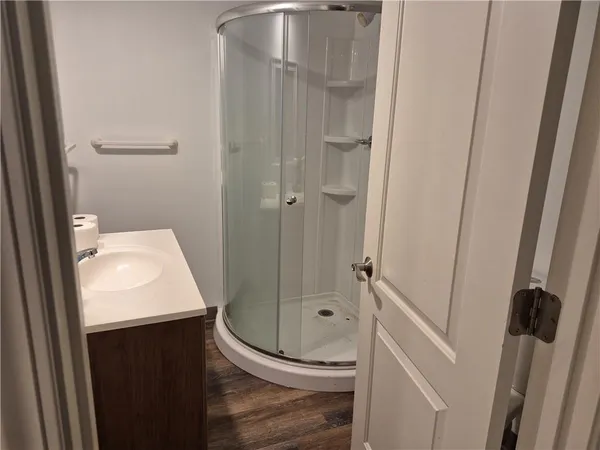 a bathroom with a sink and toilet