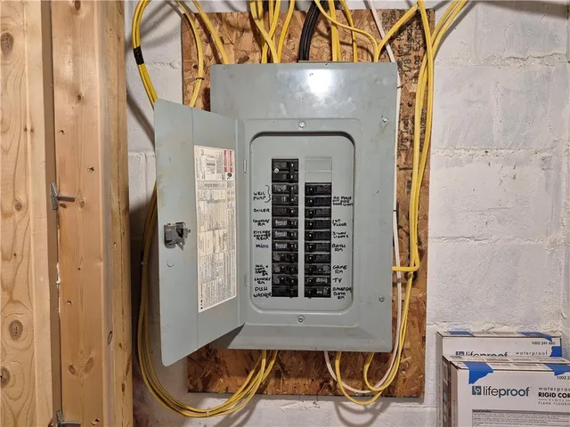 a front view of a house with porch and windows