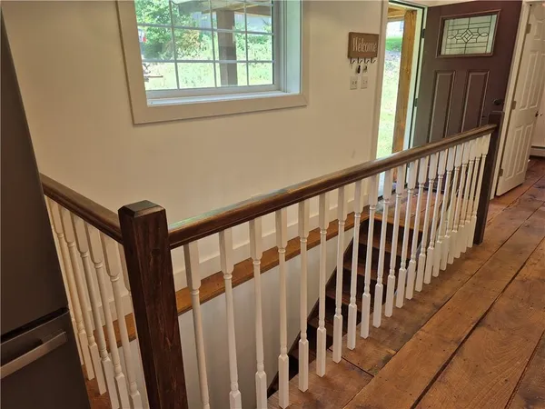 a view of a stairs and an entryway