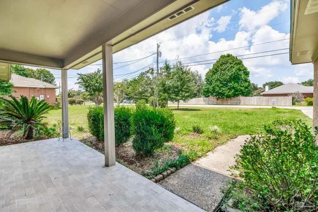 a view of a garden with a fountain
