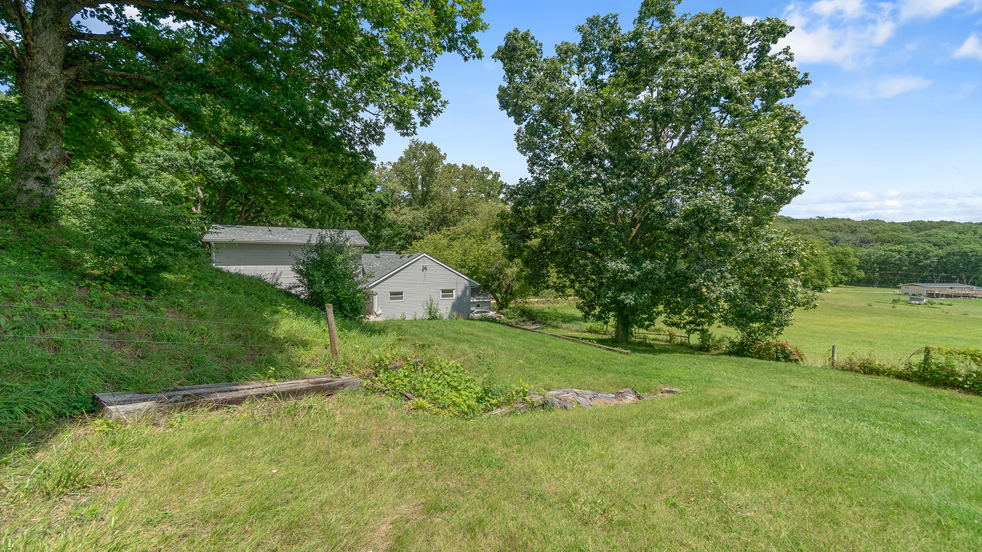 503 West Devils Backbone Road Oregon, IL 61061 - Photo 11 of 46 a view of a wooden house and a yard
