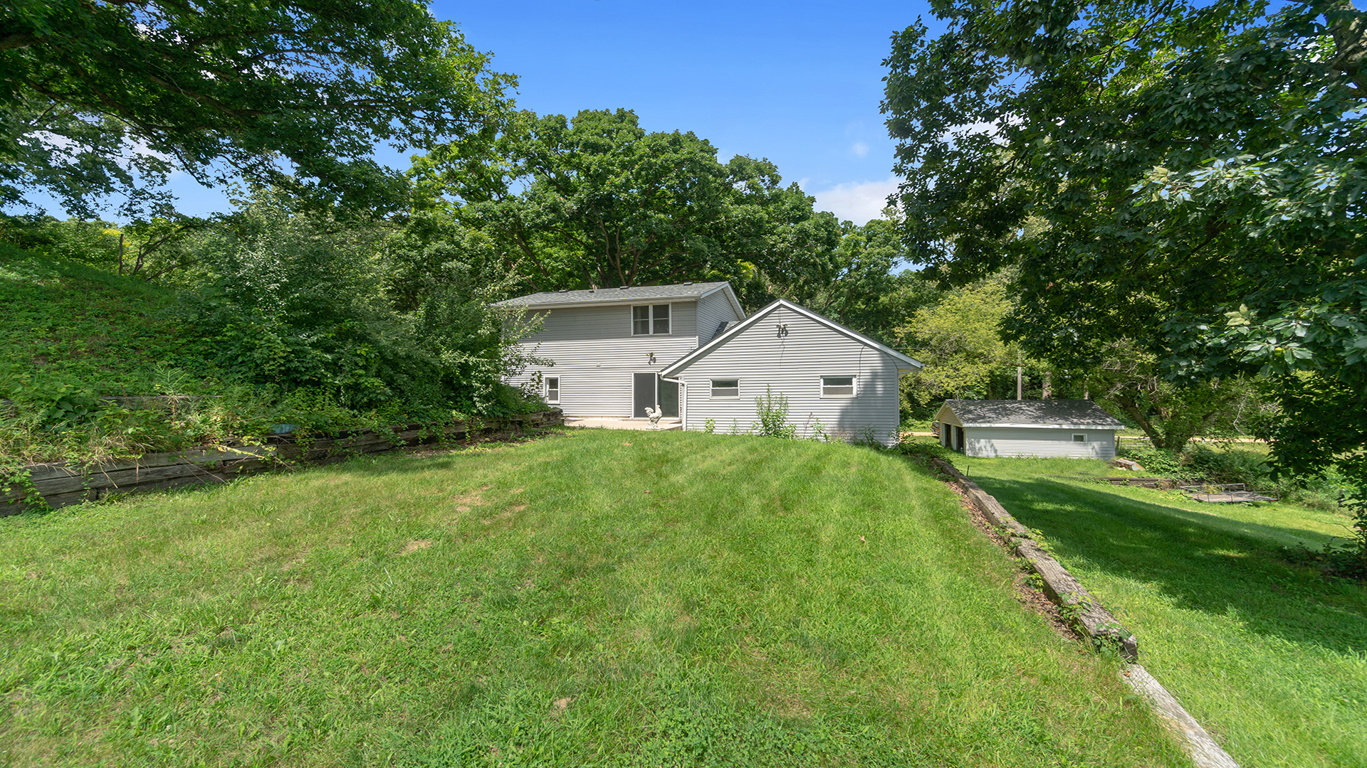 503 West Devils Backbone Road Oregon, IL 61061 - Photo 12 of 46 a front view of a house with garden